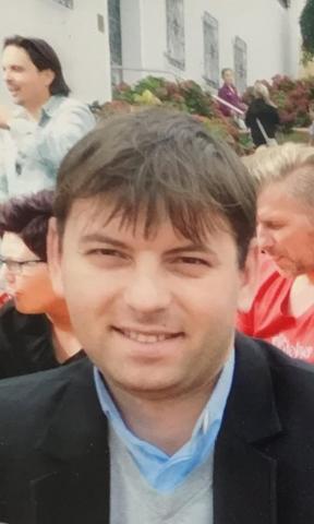 Pr. Marius Mărtinaş - Roman